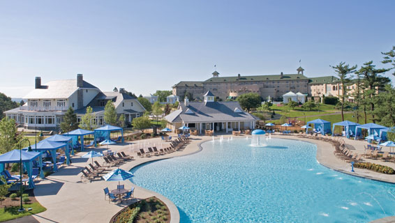 Outdoor pool at The Hotel Hershey with plenty of lounge seating and cabanas for relaxation.>
	    <!--<p class=