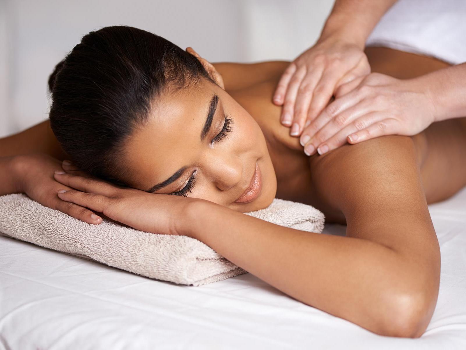 Woman receiving a massage at The Spa At The Hotel Hershey